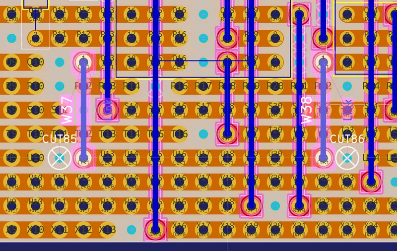 A close-up of the board in the PCB editor showing strips, cut markers and wire links on their holes
